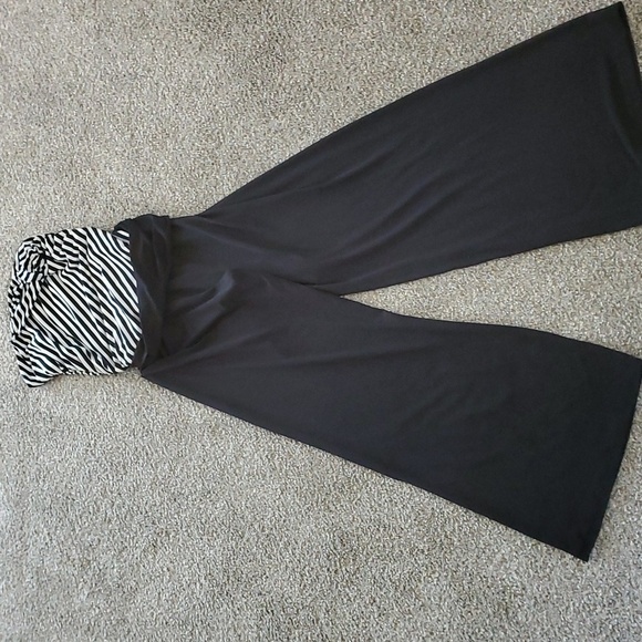 Haulter jumpsuits. Black and white striped top. Black bottom Wide leg. By Lepis - Picture 2 of 8